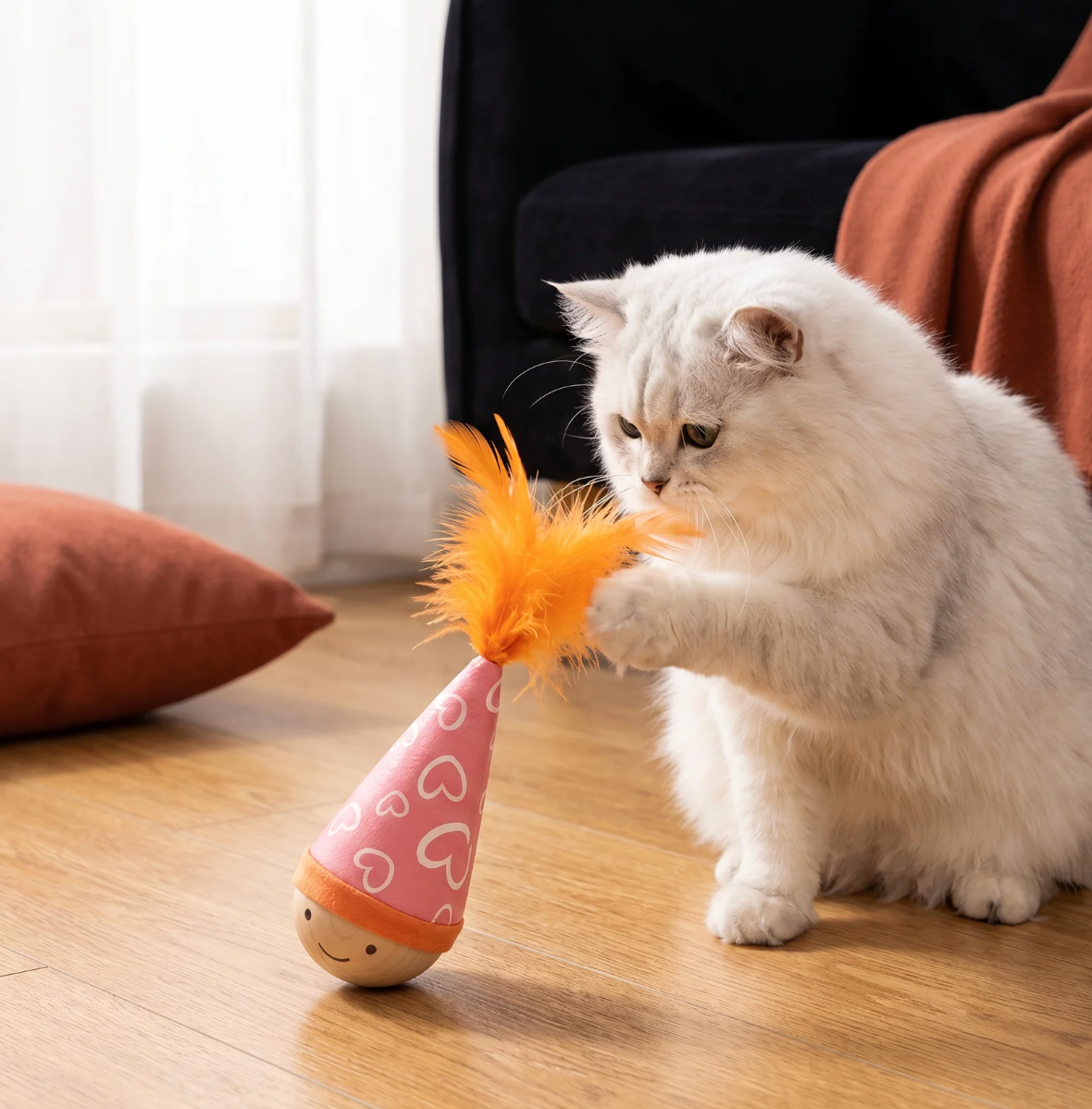 Stehauf-Katzenspielzeug mit Federn